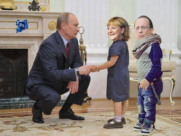 Putinas priima dvi makakino lėlytes.jpg